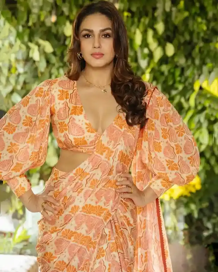 Huma Qureshi Mesmerizing Looks In Beautiful Orange Saree